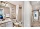 Hall bathroom with combined tub and shower offers convenience and functionality for everyday living at 6570 Parterre N Pkwy # 6, Thornton, CO 80602
