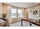 This office features neutral paint, carpeted floors, and two large windows that let in plenty of natural light at 6570 Parterre N Pkwy # 6, Thornton, CO 80602