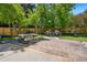 Community grilling area with picnic table and gas grills at 7040 E Girard Ave # 207, Denver, CO 80224