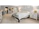 Light-filled main bedroom featuring plush carpet, light neutral decor, and access to closet and bathroom at 7040 E Girard Ave # 207, Denver, CO 80224