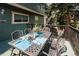 Back deck with table setting that creates an ideal outdoor space for alfresco dining and relaxation at 3883 S Fraser St, Aurora, CO 80014