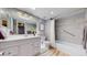 Stylish bathroom featuring updated fixtures and a shower-over-tub at 3883 S Fraser St, Aurora, CO 80014