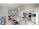 Open concept living space with dining area and kitchen, great for entertaining at 3883 S Fraser St, Aurora, CO 80014