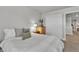 Bedroom features large closet, neutral carpet, and ample space at 8145 Monte Vista Cir, Littleton, CO 80125