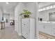 Bright hallway features white accents and access to bath and living spaces at 8145 Monte Vista Cir, Littleton, CO 80125