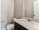 Modern bathroom featuring a vanity with quartz countertop at 4284 Gozzer Ranch Dr, Elizabeth, CO 80107