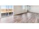 Bright living room with sliding doors to backyard at 4284 Gozzer Ranch Dr, Elizabeth, CO 80107