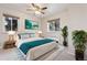 Spacious bedroom with ceiling fan and large windows at 1101 Bellaire St # 108, Denver, CO 80220
