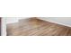 Living area showcases gleaming hardwood floors at 1101 Bellaire St # 108, Denver, CO 80220