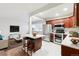 Modern kitchen with updated cabinetry, stainless steel appliances, and an island at 1101 Bellaire St # 108, Denver, CO 80220