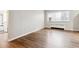 Bright living room with hardwood floors and large windows at 1101 Bellaire St # 108, Denver, CO 80220