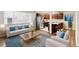 Open concept living space with wood floors and kitchen views at 1101 Bellaire St # 108, Denver, CO 80220