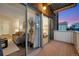 Exterior view from private deck looking into the unit's living room and bedroom at 4110 Hale Pkwy Pkwy # 4J, Denver, CO 80220