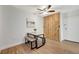Dining area with bench seating and a rustic sliding door at 4110 Hale Pkwy Pkwy # 4J, Denver, CO 80220