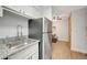 Kitchen featuring stainless steel appliances and ample counter space at 4110 Hale Pkwy Pkwy # 4J, Denver, CO 80220