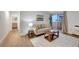 Comfortable living room with balcony access and modern decor at 4110 Hale Pkwy Pkwy # 4J, Denver, CO 80220
