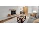 Inviting living room featuring a fireplace and stylish furnishings at 4110 Hale Pkwy Pkwy # 4J, Denver, CO 80220