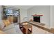 Bright living room with fireplace and cozy seating arrangement at 4110 Hale Pkwy Pkwy # 4J, Denver, CO 80220