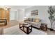 Cozy living room with neutral tones and a comfortable sofa at 4110 Hale Pkwy Pkwy # 4J, Denver, CO 80220