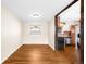 Cozy dining area with hardwood floors, a connecting view into the kitchen, and ample natural light at 625 Ammons St, Lakewood, CO 80214