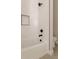 Bathroom with modern fixtures, white subway tile, and black showerhead at 8260 E 36Th Ave # 29, Denver, CO 80238