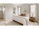 Bright bedroom with a comfortable bed, ample natural light, and stylish contemporary furnishings at 8260 E 36Th Ave # 29, Denver, CO 80238