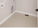 Laundry room ready for washer and dryer hookups featuring tile flooring at 8260 E 36Th Ave # 29, Denver, CO 80238
