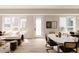 Bright open living and dining space with modern furnishings and natural light at 8260 E 36Th Ave # 29, Denver, CO 80238