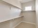 Well-organized walk-in closet with ample shelving, and a bright and airy feel at 8260 E 36Th Ave # 29, Denver, CO 80238