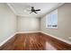 Room featuring hardwood floors, a ceiling fan, and a window with a view at 2 Viking Dr, Englewood, CO 80113