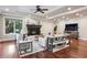 Bright living room with fireplace, hardwood floors, recessed lighting, and neutral decor at 2 Viking Dr, Englewood, CO 80113