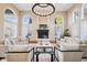 Beautifully decorated living room with hardwood floors, fireplace, and modern lighting at 2 Viking Dr, Englewood, CO 80113