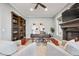 Cozy home office features a fireplace, custom bookshelves, and comfortable seating at 2 Viking Dr, Englewood, CO 80113