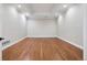 Bright room with hardwood floors, recessed lights and crown molding perfect for an office or den at 2 Viking Dr, Englewood, CO 80113