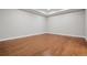 Spacious room featuring hardwood floors, recessed lighting, and crown molding for an elegant feel at 2 Viking Dr, Englewood, CO 80113