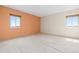 Spacious bedroom featuring soft carpeting and two windows at 2880 S Locust St # 708S, Denver, CO 80222