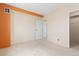 Carpeted bedroom with an open doorway revealing a walk-in closet at 2880 S Locust St # 708S, Denver, CO 80222