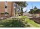 A well-maintained lawn and trees surrounding the building's exterior at 2880 S Locust St # 708S, Denver, CO 80222