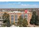 Brick apartment building with private balconies, offering urban living with outdoor spaces at 2880 S Locust St # 708S, Denver, CO 80222