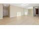 Bright living room with modern flooring and mirrored wall at 2880 S Locust St # 708S, Denver, CO 80222