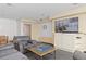 A community entertainment space with comfortable seating and large-screen television at 2880 S Locust St # 708S, Denver, CO 80222