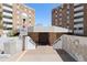Exterior shot of the main entrance featuring double doors and a brick-paved walkway at 2880 S Locust St # 708S, Denver, CO 80222