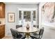 Cozy dining area with a bay window and modern decor at 1189 Lodgepole Dr, Evergreen, CO 80439