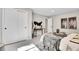 Spacious main bedroom features closet and modern furnishings at 1189 Lodgepole Dr, Evergreen, CO 80439