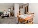 Open concept dining area with seating for four, attached to the living room and kitchen at 2296 S Pitkin Way # A, Aurora, CO 80013