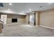 Finished basement with carpet, recessed lighting, and a window, providing extra living space for recreation or relaxation at 602 Mathews Way, Erie, CO 80516
