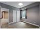 Cozy bedroom with carpet, closet, and window, offering a comfortable and private retreat at 602 Mathews Way, Erie, CO 80516