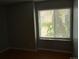 Bedroom with view from window at 10792 E Exposition Ave Ave # 254, Aurora, CO 80012