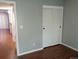 Bedroom with closet and wood flooring, freshly painted at 10792 E Exposition Ave Ave # 254, Aurora, CO 80012