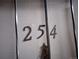 Apartment 254's metal screen door with numbers at 10792 E Exposition Ave Ave # 254, Aurora, CO 80012